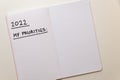 Blank page of diary with text `2022 my priorities`. Royalty Free Stock Photo