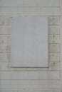 Blank panel on white painted wooden wall Royalty Free Stock Photo