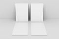 Blank paper againstwhite wall Royalty Free Stock Photo