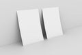 Blank paper againstwhite wall Royalty Free Stock Photo