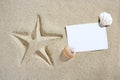 Blank paper beach sand starfish pint shells summer Royalty Free Stock Photo