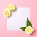 Blank paper card with rose flower petals on pastel pink background. Invitation, greeting card or an element for your design. Top Royalty Free Stock Photo