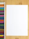 Blank paper and colorful crayons Royalty Free Stock Photo