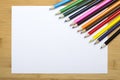 Blank paper and colorful crayons Royalty Free Stock Photo
