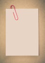 Blank paper note and metal clip Royalty Free Stock Photo