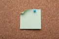 Blank paper note pinned to cork background, closeup Royalty Free Stock Photo