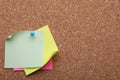 Blank paper notes pinned to cork background. Space for text Royalty Free Stock Photo