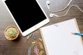 Blank paper, pencil, and smart phone on wood desk