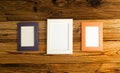 Blank Paper Photo Frames Top View, Empty White Frame on Wood Table Flat Lay Mockup, Paper Photo Frames Royalty Free Stock Photo