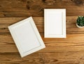 Blank Paper Photo Frames Top View, Empty White Frame on Wood Table Flat Lay Mockup, Paper Photo Frames Royalty Free Stock Photo