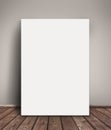 Blank Paper Poster Mock Up Leaning Against Wall Royalty Free Stock Photo