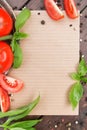 Blank paper for recipe or notes with ripe sweet tomatos Royalty Free Stock Photo