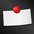 Blank paper sheet fixed by red pin magnet