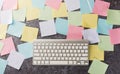 Blank paper stick note list with the modern computer keyboard Royalty Free Stock Photo