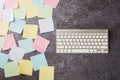 Blank paper stick note list with the modern computer keyboard Royalty Free Stock Photo