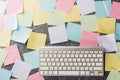Blank paper stick note list with the modern computer keyboard Royalty Free Stock Photo