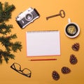 Blank paper with various objcects around it on yellow background - Trendy minimal flat lay concept Royalty Free Stock Photo