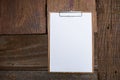 Blank paper on wood clipboard