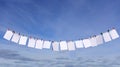 Blank papers on a clothesline Royalty Free Stock Photo