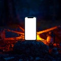 Blank Phone Screen Campfire Glow Outdoor Tech Mockup Royalty Free Stock Photo