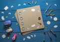 Blank photo album and scrapbooking tools Royalty Free Stock Photo