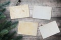 Empty old instant photos paper on wood table in christmas. Royalty Free Stock Photo