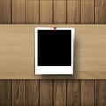 Blank photo frame on wooden texture background Royalty Free Stock Photo