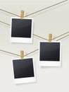 Blank photo frames on clotheslines Royalty Free Stock Photo