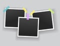 Blank photo frames hanging on adhesive tape. Vintage mockups template for memory album or scrapbook. Retro pictures with