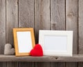 Blank photo frames and heart gifts Royalty Free Stock Photo