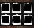 Blank photo frames with tapes, on blackboard backgrounds with wooden frame