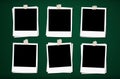 Blank photo frames with tapes, on green board backgrounds Royalty Free Stock Photo