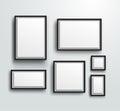Blank photo frames on the wall. Design for a modern interior. Vertical and horizontal A-4, and square picture frame. Vector illust