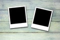 Blank photo frames on wood background Royalty Free Stock Photo