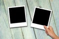 Blank photo frames on wood background Royalty Free Stock Photo