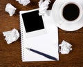 Blank photo on notepad with pen Royalty Free Stock Photo