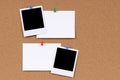 Polaroid frames blank paper index cards cork background copy space Royalty Free Stock Photo