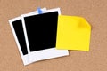 Polaroid photo frames yellow post-it style sticky note cork board Royalty Free Stock Photo