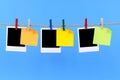 Polaroid photo frames with post it style sticky notes string rope washing line Royalty Free Stock Photo