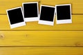 Row polaroid frame photo prints wood table background copy space Royalty Free Stock Photo