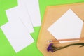 blank of photos and the clean blank of photo in a postal envelope on a green background Royalty Free Stock Photo