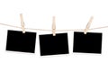 Blank photos hanging on clothesline Royalty Free Stock Photo