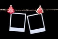 Blank photos hanging on rope Royalty Free Stock Photo