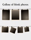 Blank photos hanging on a wire rope and clothesline with metallic clip. Art gallery of retro photo frames in different Royalty Free Stock Photo