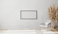Blank picture frame in bright contemporary empty room interior with luxury white chair on wooden parquet floor and white