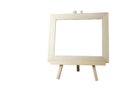 Blank picture frame with easel on white background with Royalty Free Stock Photo