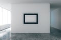 Blank picture frame in empty loft room with white walls Royalty Free Stock Photo