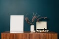 Blank picture frame mockup on green wall. View of modern scandinavian style interior with artwork mock up on wall Royalty Free Stock Photo