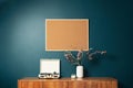 Blank picture frame mockup on green wall. View of modern scandinavian style interior with artwork mock up on wall Royalty Free Stock Photo