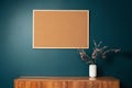 Blank picture frame mockup on green wall. View of modern scandinavian style interior with artwork mock up on wall Royalty Free Stock Photo